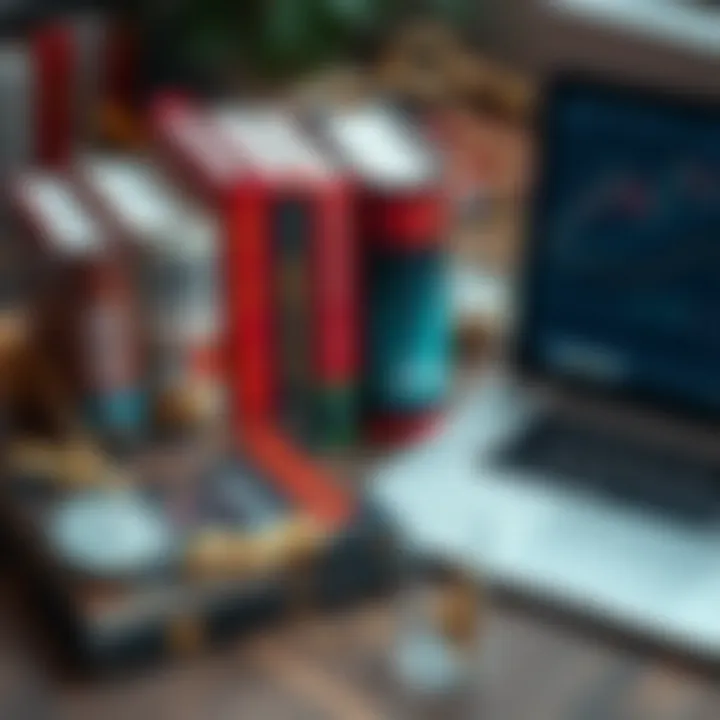 Collection of popular forex trading books arranged on a wooden surface next to a laptop